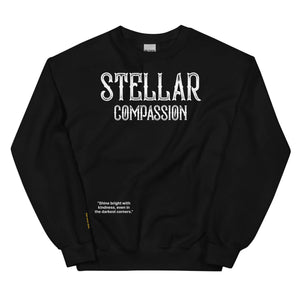 Unisex black sweatshirt with "Stellar Compassion" text, promoting kindness and positivity