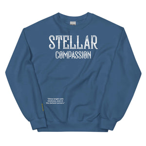 Stellar Compassion Unisex Sweatshirt in blue with "Shine bright with kindness, even in the darkest corners" text.