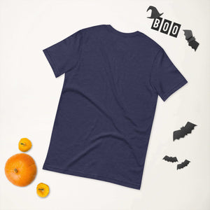 Navy unisex t-shirt on a Halloween-themed flat lay with pumpkins and bat decorations.