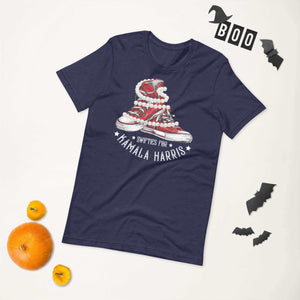 Unisex navy t-shirt featuring Swifties for Kamala Harris design with chucks and pearls, surrounded by Halloween bats and pumpkins.